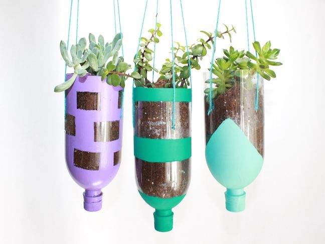 Upcycle used plastic bottles into hanging planters