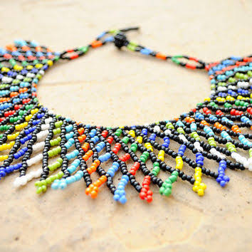 Learn how to make your own beautiful  glass bead collar necklace. All materials provided